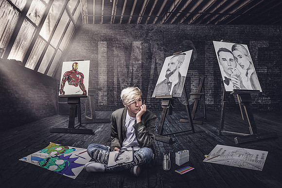 Senior boy in art loft custom MJCollins Photography